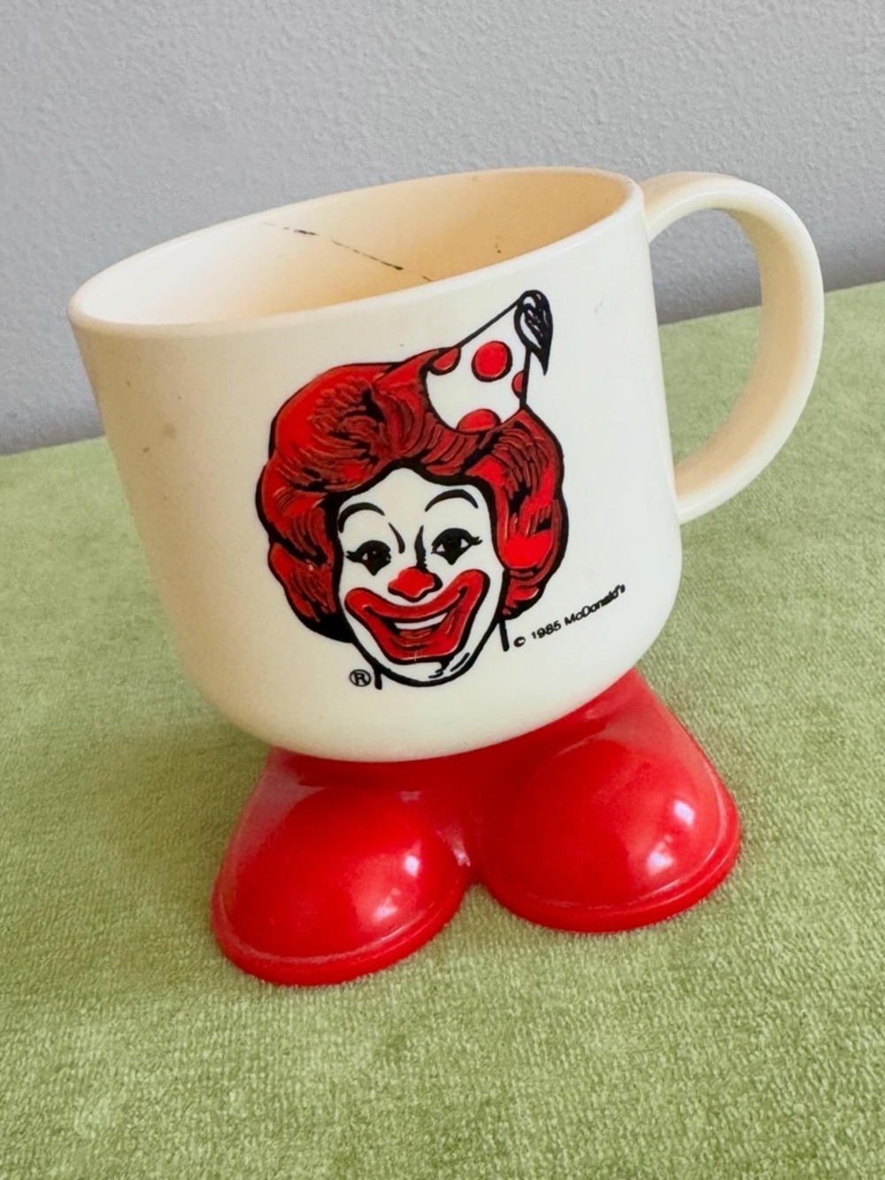 1985 McDonald’s Ronald McDonald footed plastic mug.